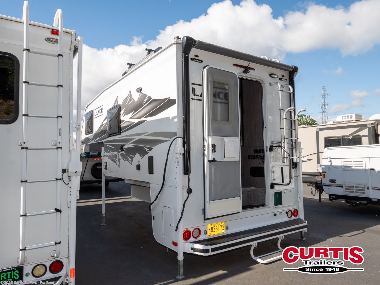 Call now about this 2022 Lance 960! 2022 Lance 960 - Used Truck Camper For Sale by Curtis Trailers - Portland in Portland, Oregon