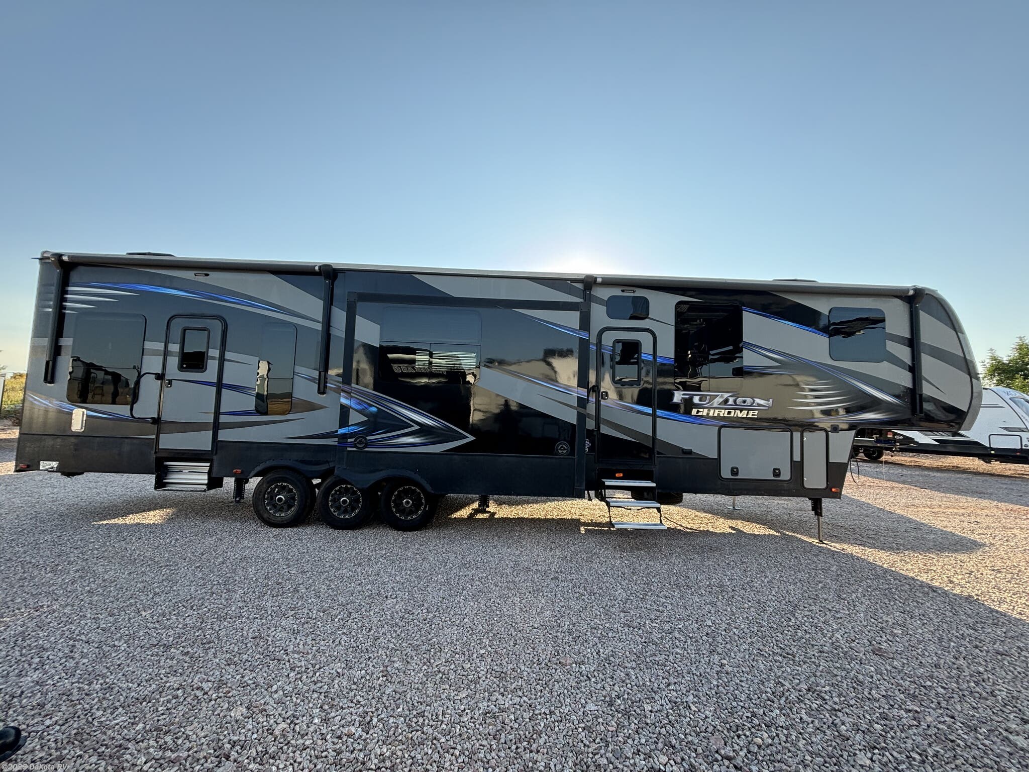 Call now about this 2016 Keystone Fuzion 414! 2016 Keystone Fuzion 414 - Used Toy Hauler For Sale by Dakota RV in Rapid City, South Dakota features Exterior Speakers, Awning, Medicine Cabinet, Auxiliary Battery, Bunk Beds