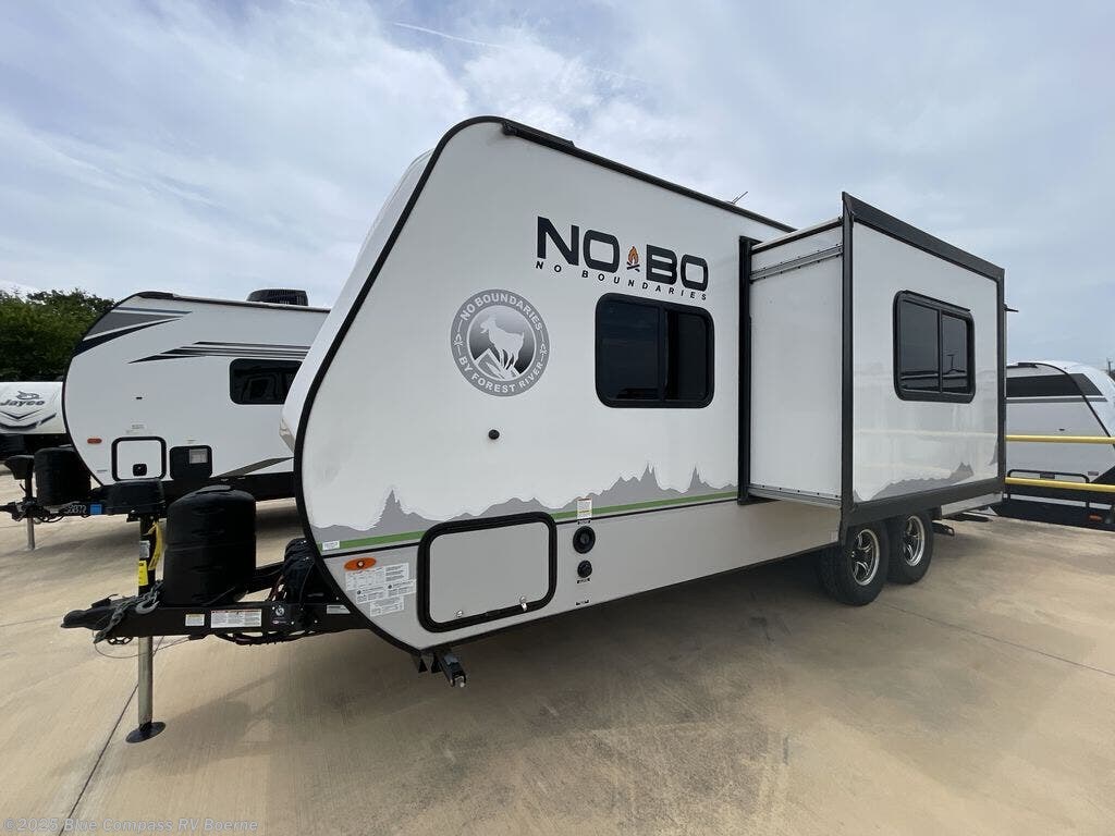 Call now about this 2022 Forest River No Boundaries NB19.6! 2022 Forest River No Boundaries NB19.6 - Used Travel Trailer For Sale by Blue Compass RV Boerne in Boerne, Texas