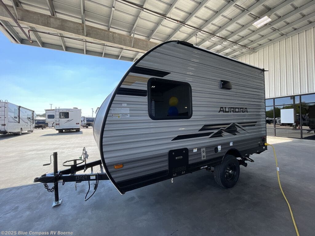 Contact us now about this 2026 Forest River Aurora Light 13BHX! 2026 Aurora Light 13BHX by Forest River from Blue Compass RV Boerne in Boerne, Texas