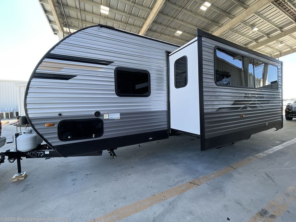 Contact us now about this 2026 Forest River Aurora Light 26BHS! 2026 Aurora Light 26BHS by Forest River from Blue Compass RV Boerne in Boerne, Texas
