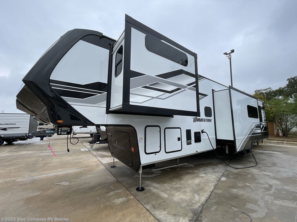 Contact us now about this 2026 Grand Design Momentum 395MT! 2026 Momentum 395MT by Grand Design from Blue Compass RV Boerne in Boerne, Texas