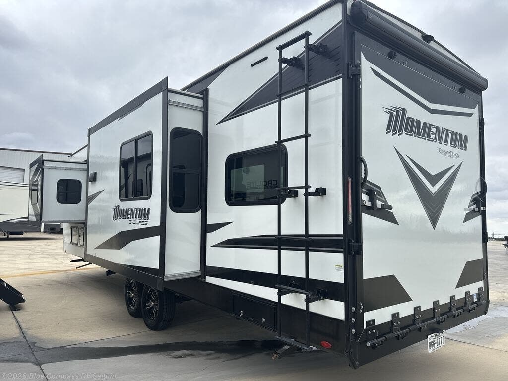 Call now about this 2023 Grand Design Momentum G-Class 28G! 2023 Grand Design Momentum G-Class 28G - Used Toy Hauler For Sale by Blue Compass RV Seguin in Seguin, Texas