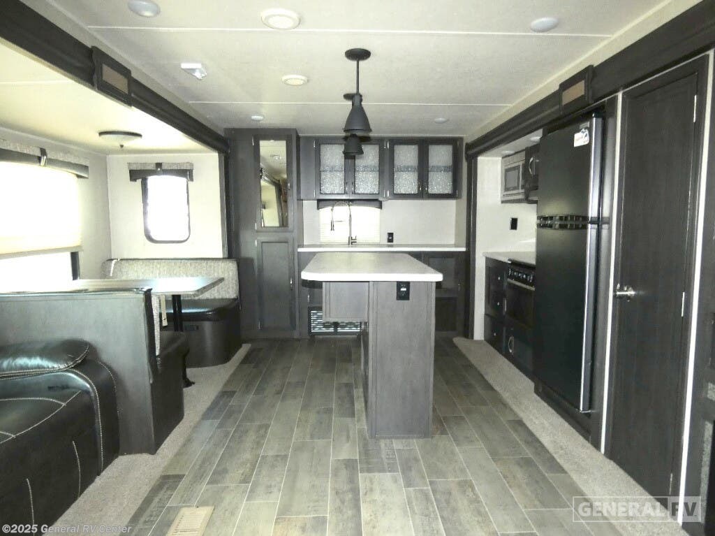 Call now about this 2019 Palomino Puma 31RKSS-2SLD! 2019 Palomino Puma 31RKSS-2SLD - Used Travel Trailer For Sale by General RV Center in Wayland, Michigan