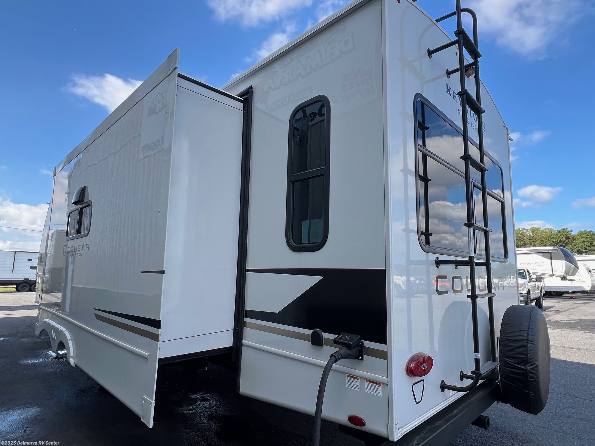 Contact us now about this 2026 Keystone Cougar Half-Ton East 29RLP! 2026 Cougar Half-Ton East 29RLP by Keystone from Delmarva RV Center (Milford North) in Milford North, Delaware
