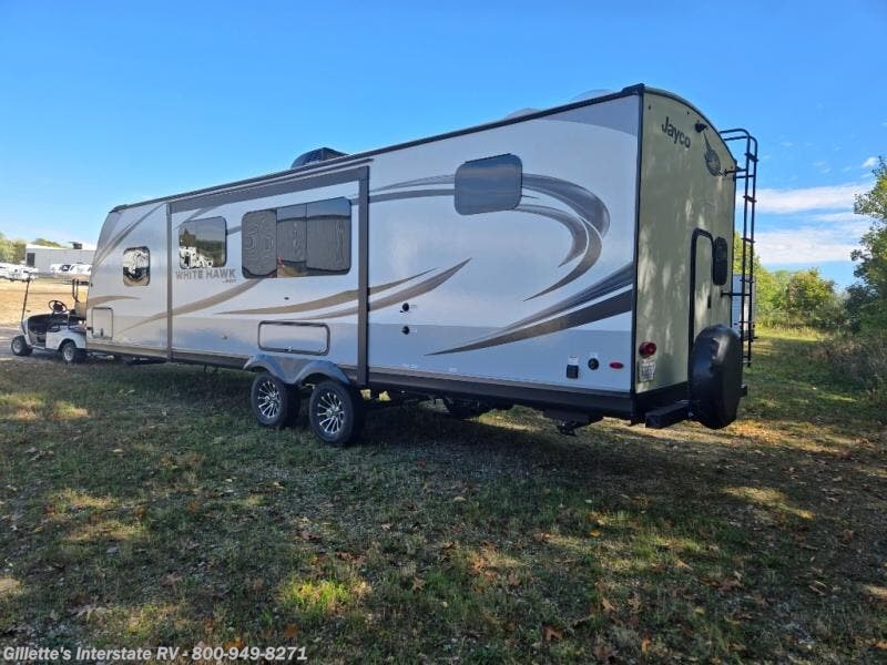 Call now about this 2024 Jayco White Hawk 29BH! 2024 Jayco White Hawk 29BH - Used Travel Trailer For Sale by Gillette's Interstate RV in Haslett, Michigan features Slideout