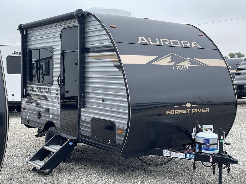 Contact us now about this 2025 Forest River Aurora Light 13RDX! 2025 Aurora Light 13RDX by Forest River from Blue Compass RV Park City in Park City, Kansas