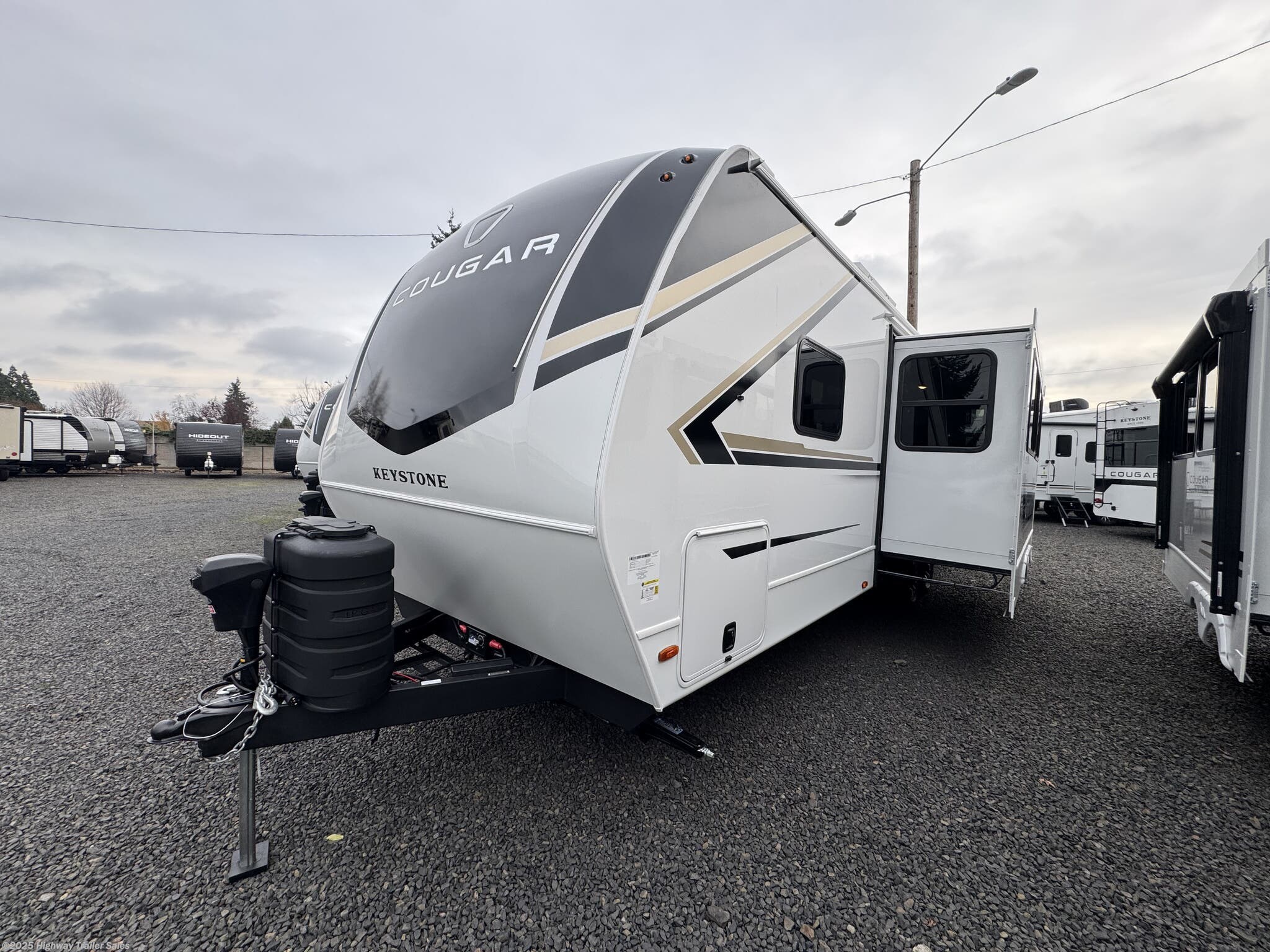 Contact us now about this 2026 Keystone Cougar Half-Ton 28BHWE! 2026 Cougar Half-Ton 28BHWE by Keystone from Highway Trailer Sales in Salem, Oregon