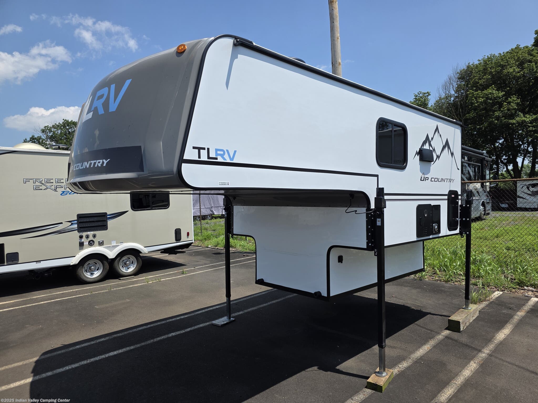 Call now about this 2026 Travel Lite Up Country 775U! 2026 Travel Lite Up Country 775U - New Truck Camper For Sale by Indian Valley Camping Center in Souderton, Pennsylvania features Refrigerator, Microwave, CO Detector, TV, Air Conditioning