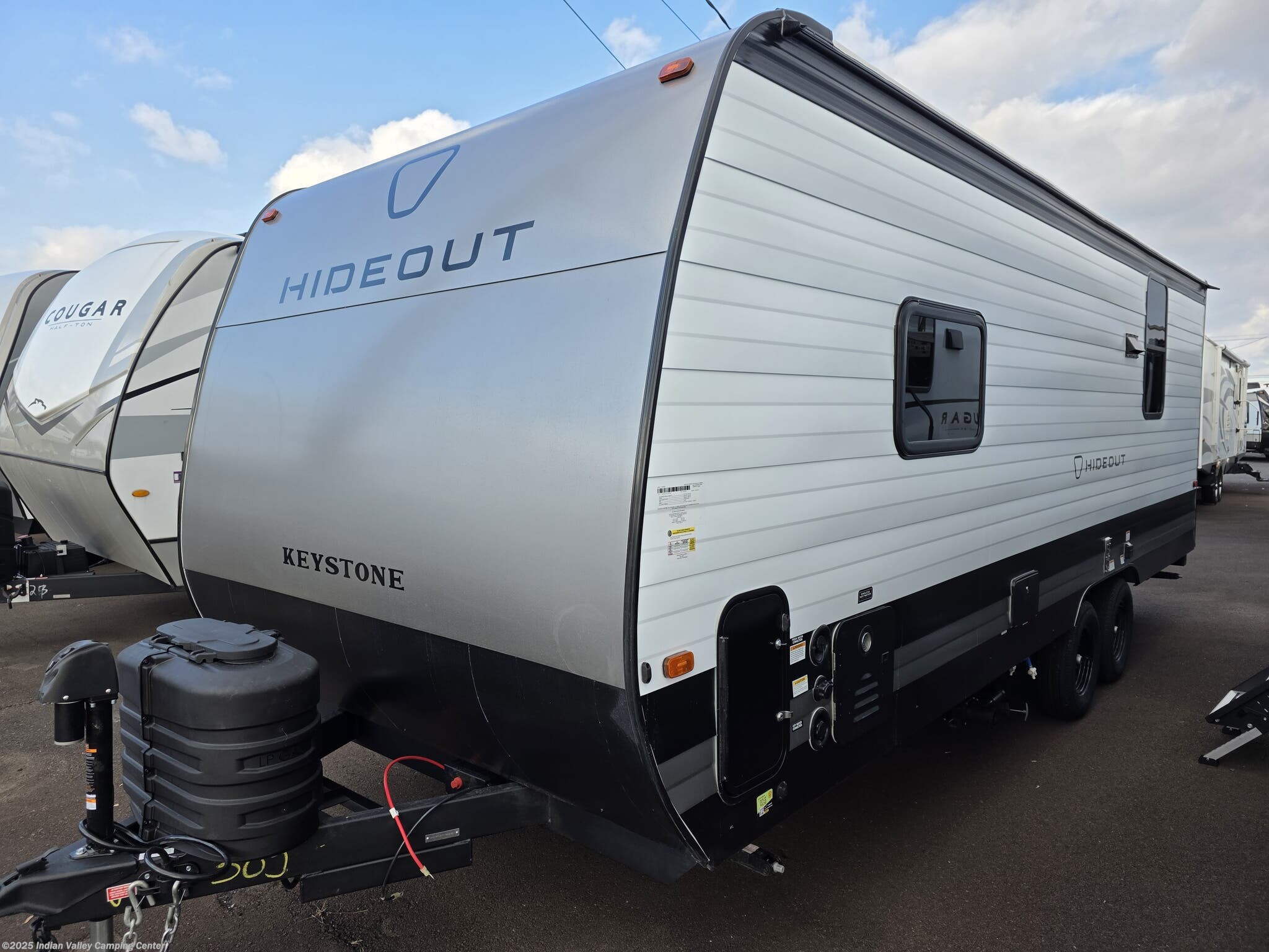 Call now about this 2026 Keystone Hideout 210RL! 2026 Keystone Hideout 210RL - New Travel Trailer For Sale by Indian Valley Camping Center in Souderton, Pennsylvania features Water Heater, Furnace, Spare Tire Kit, Fire Extinguisher, Refrigerator