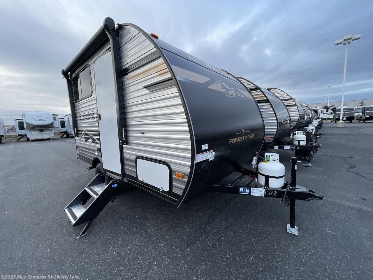 Contact us now about this 2026 Forest River Aurora Light 13BHX! 2026 Aurora Light 13BHX by Forest River from Blue Compass RV Liberty Lake in Liberty Lake, Washington