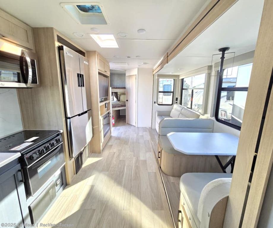 Contact us now about this 2024 Winnebago Voyage 3033BH! 2024 Voyage 3033BH by Winnebago from La Mesa | RecVan - Tucson in Tucson, Arizona