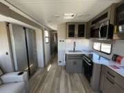 Call now about this 2025 Grand Design Reflection 296RDTS! 2025 Grand Design Reflection 296RDTS - New Travel Trailer For Sale by McClain's Longhorn RV in Sanger, Texas features Pantry, Refrigerator, Washer/Dryer Prep, CO Detector, Theater Seating