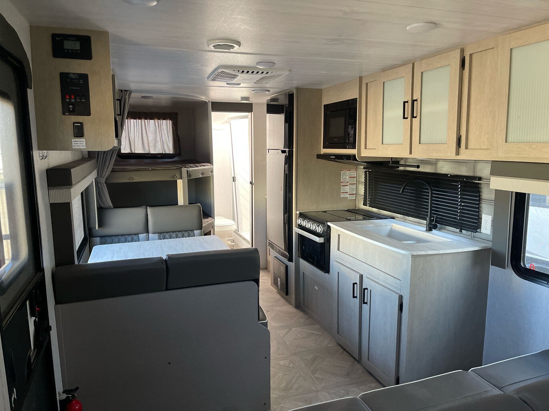 Call now about this 2023 Forest River WILDWOODXLITE 261BHXL! 2023 Forest River WILDWOODXLITE 261BHXL - Used Travel Trailer For Sale by McClain's RV Fort Worth in Fort Worth, Texas features Water Heater, Solar Prep, Awning, PVC Roof, TV