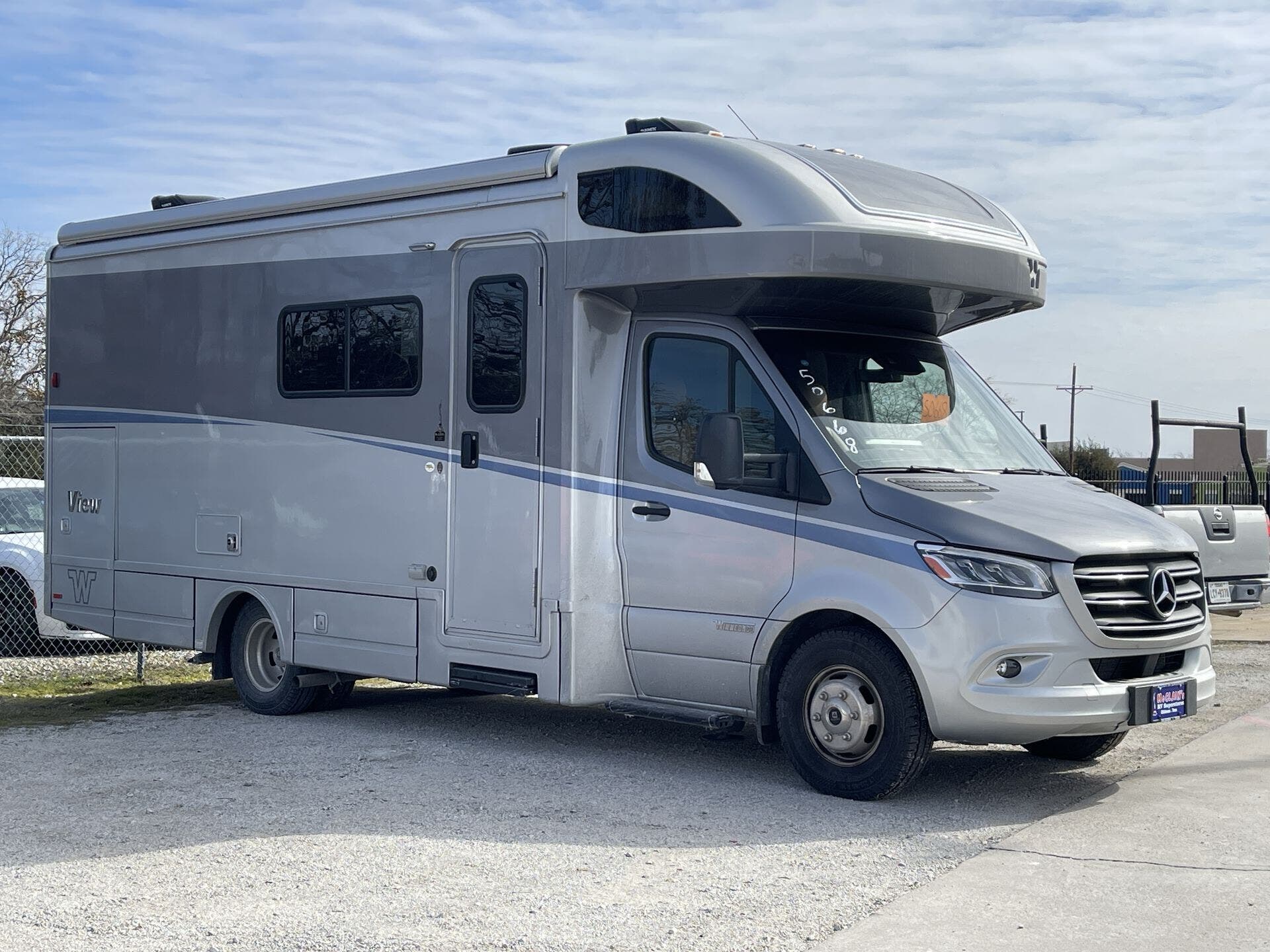 Call now about this 2025 Winnebago View 24T! 2025 Winnebago View 24T - Used Class C For Sale by McClain's RV Oklahoma City in Oklahoma City, Oklahoma features Auxiliary Battery, Slideout, Queen Bed, Power Roof Vent, Smoke Detector