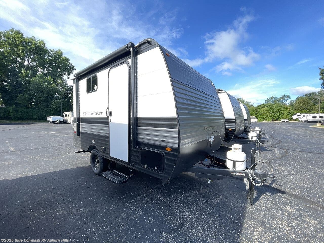 Contact us now about this 2026 Keystone Hideout Mini 130BH! 2026 Hideout Mini 130BH by Keystone from Blue Compass RV Auburn Hills in Auburn Hills, Michigan