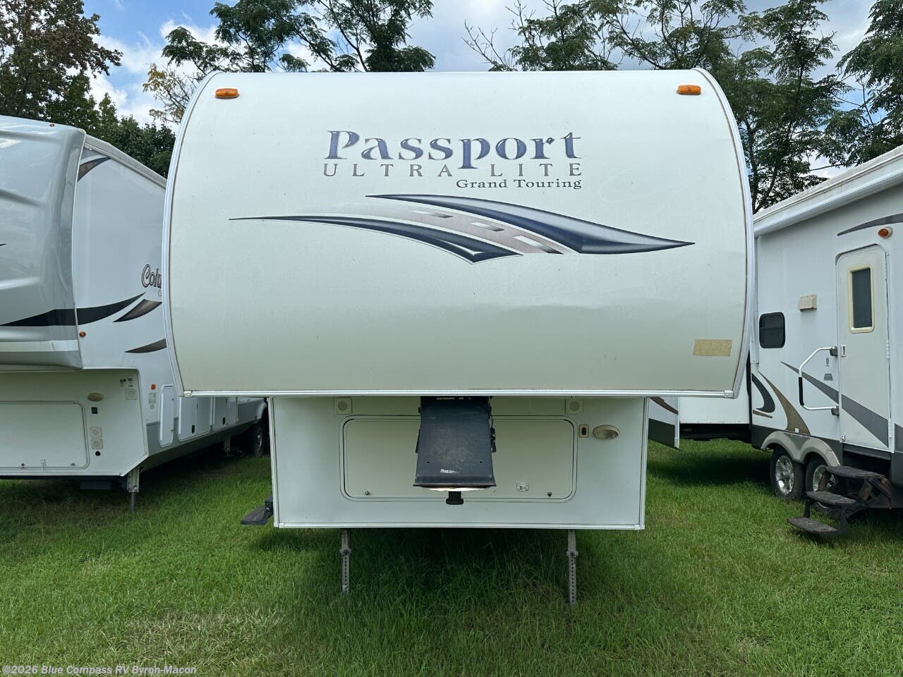 Contact us now about this 2013 Keystone Passport 5260RL! 2013 Passport 5260RL by Keystone from Blue Compass RV Byron-Macon in Byron, Georgia