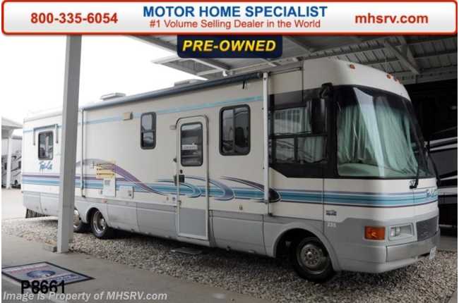 1997 National RV Tropical 235 with slide &amp; Tag Axle