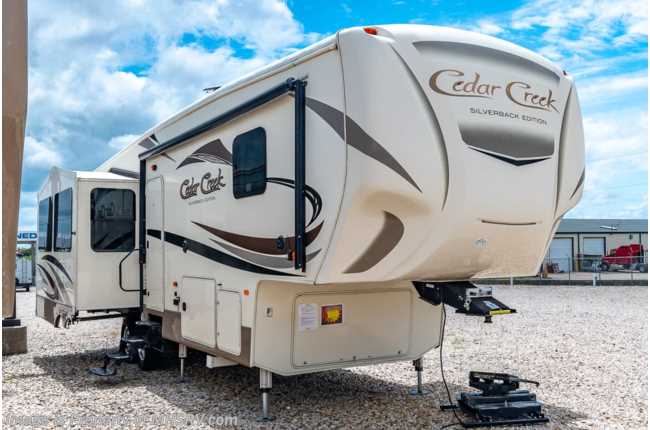 2017 Forest River Cedar Creek 29RE W/ Rims, Auto Leveling, Fireplace, Oven and King Bed