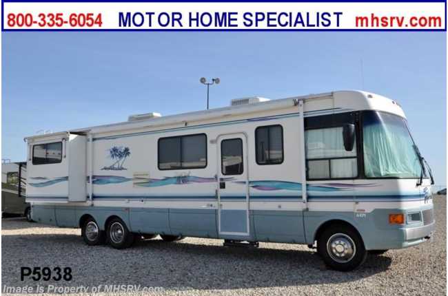 1999 National RV Tropical W/2 Slides and Tag Axle Used RV for Sale