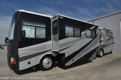 &lt;a href=&quot;http://www.mhsrv.com/other-rvs-for-sale/fleetwood-rvs/&quot;&gt;&lt;img src=&quot;http://www.mhsrv.com/images/sold-fleetwood.jpg&quot; width=&quot;383&quot; height=&quot;141&quot; border=&quot;0&quot; /&gt;&lt;/a&gt;
2003 Fleetwood Discovery 39&#39; with four slides, model 39L, Caterpillar 330 hp diesel engine, Allison 6 speed transmission, Freightliner chassis, inverter, Onan 7.5 quiet diesel generator, Power Gear leveling jack system, backup camera with audio, air brakes, cruise control, tilt/telescoping wheel, power visors, cab fans, power mirrors with heat, 6-way leather power seats, VCR, two TVs, DVD player with surround sound system, convection/microwave, gas stove top, gas oven, side-by-side refrigerator with ice maker, central vacuum, gas/electric water heater, washer dryer combo, private toilet, E.M.S., dual pane glass, day/night shades, booth dinette sleeper, leather jackknife sofa, soft touch vinyl ceilings, solid surface countertop, queen bed, large rear wardrobe cedar lined closet, power patio awning, 50 amp service, roof ladder, power entrance steps, aluminum wheels, gravel shield, bra, spotlight, exterior shower, air horns, slide out awning toppers, satellite system, dual ducted roof A/C&#39;s, 24K miles and much more. 