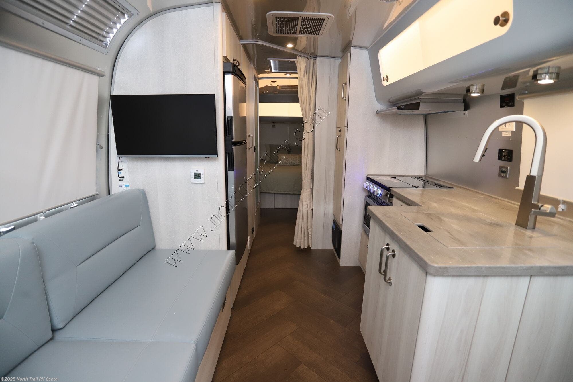 Call now about this 2026 Airstream International 27FB! 2026 Airstream International 27FB - New Travel Trailer For Sale by North Trail RV Center in Fort Myers, Florida