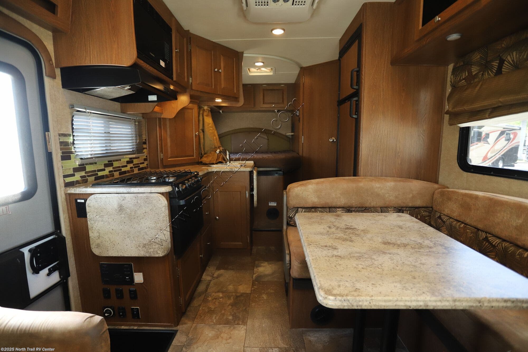 Contact us now about this 2016 Coachmen Leprechaun 231CB! 2016 Leprechaun 231CB by Coachmen from North Trail RV Center in Fort Myers, Florida