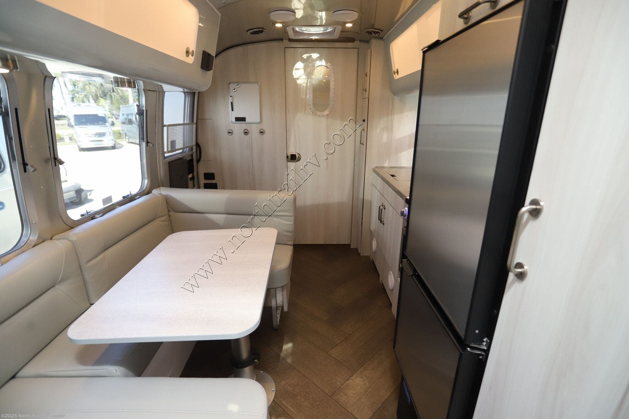 Contact us now about this 2025 Airstream International 23FB! 2025 International 23FB by Airstream from North Trail RV Center in Fort Myers, Florida