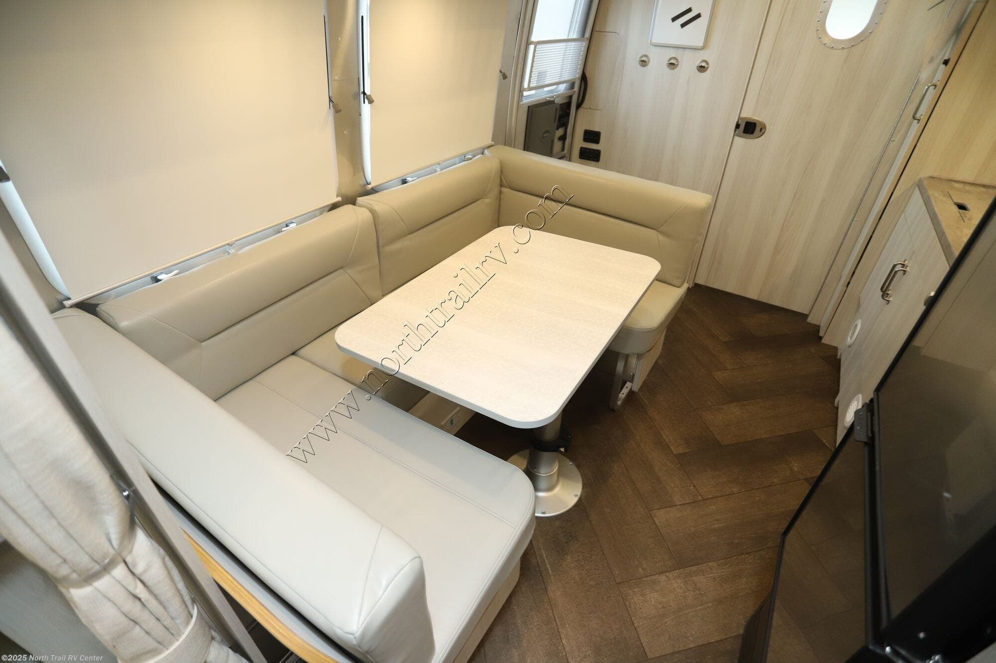 Contact us now about this 2026 Airstream International 23FB! 2026 International 23FB by Airstream from North Trail RV Center in Fort Myers, Florida