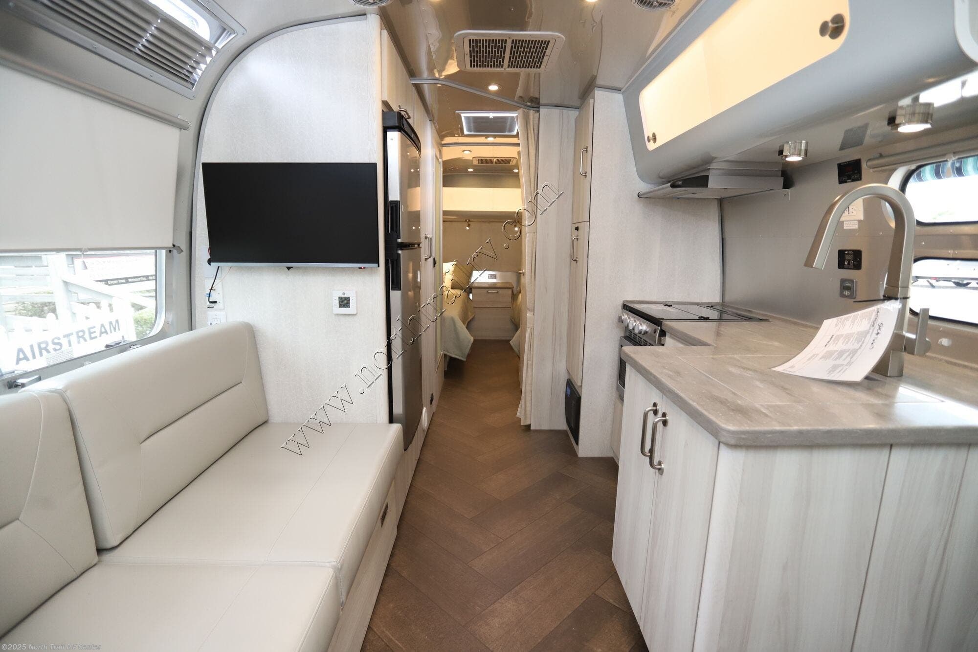 Call now about this 2026 Airstream International 27FB! 2026 Airstream International 27FB - New Travel Trailer For Sale by North Trail RV Center in Fort Myers, Florida