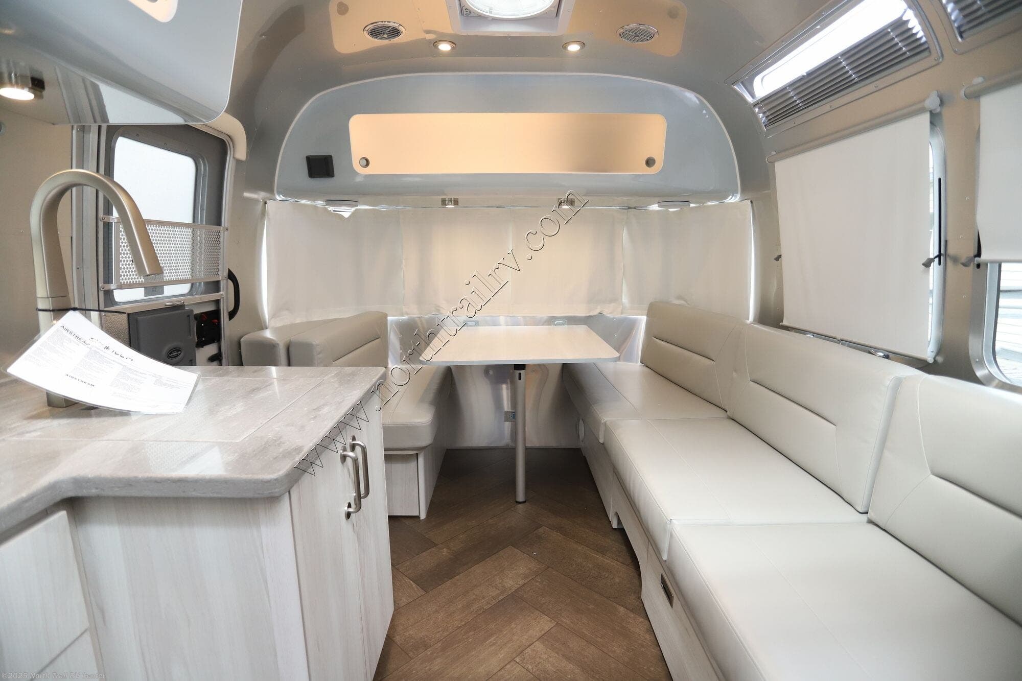 Contact us now about this 2026 Airstream International 27FB! 2026 International 27FB by Airstream from North Trail RV Center in Fort Myers, Florida