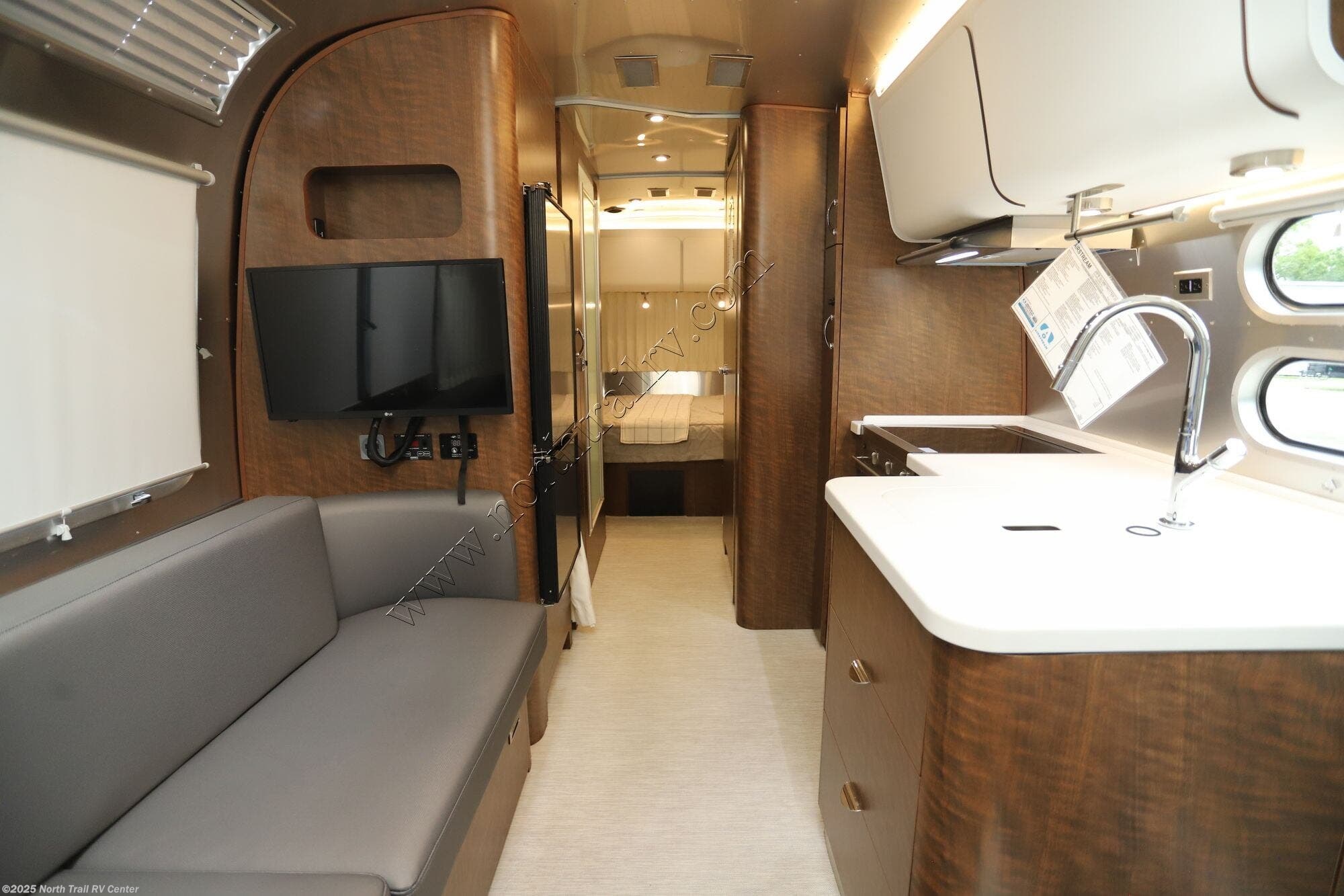 Call now about this 2021 Airstream Globetrotter 25FB! 2021 Airstream Globetrotter 25FB - Used Travel Trailer For Sale by North Trail RV Center in Fort Myers, Florida