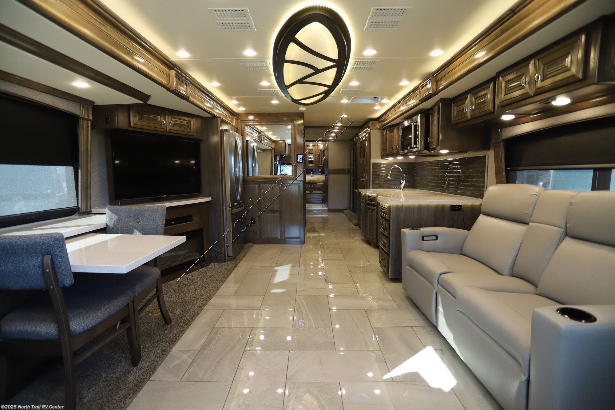 Contact us now about this 2019 Fleetwood Discovery LXE 40D! 2019 Discovery LXE 40D by Fleetwood from North Trail RV Center in Fort Myers, Florida