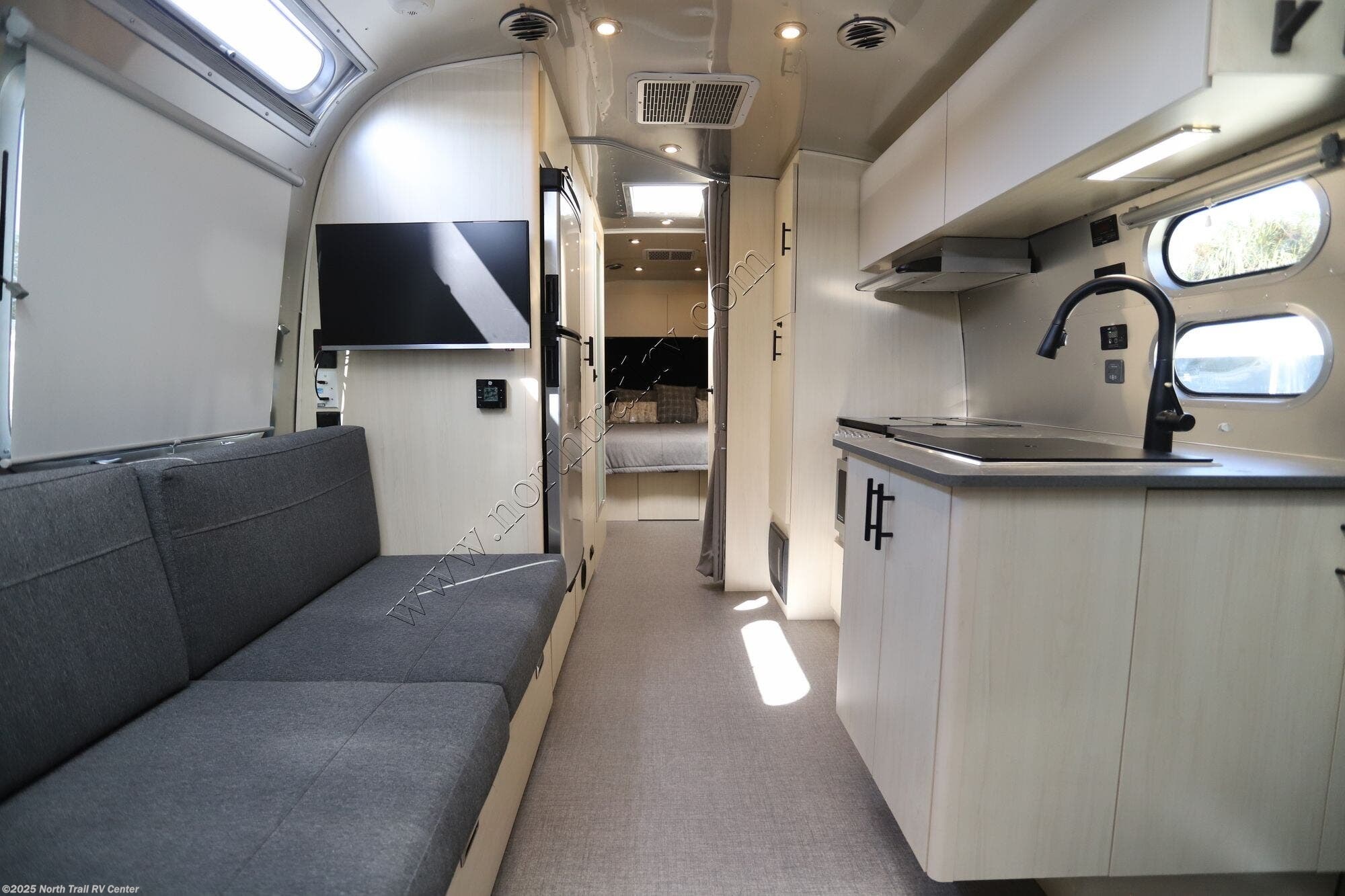 Call now about this 2025 Airstream Flying Cloud 27FB! 2025 Airstream Flying Cloud 27FB - Used Travel Trailer For Sale by North Trail RV Center in Fort Myers, Florida