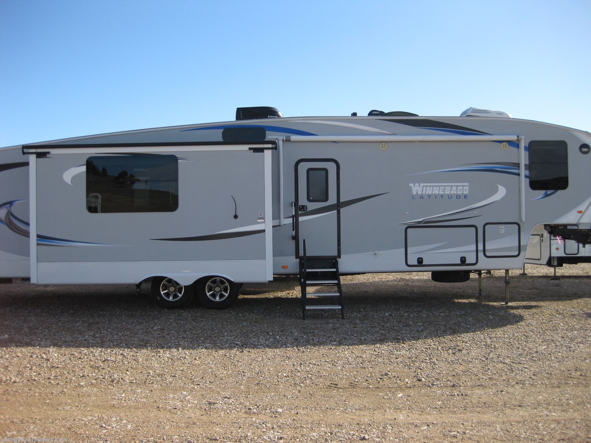 Call now about this 2016 Winnebago Latitude 34RG! 2016 Winnebago Latitude 34RG - Used Fifth Wheel For Sale by Northern Hills Homes and RV's in Whitewood, South Dakota features Oven, Smoke Detector, Stove, Refrigerator, Furnace