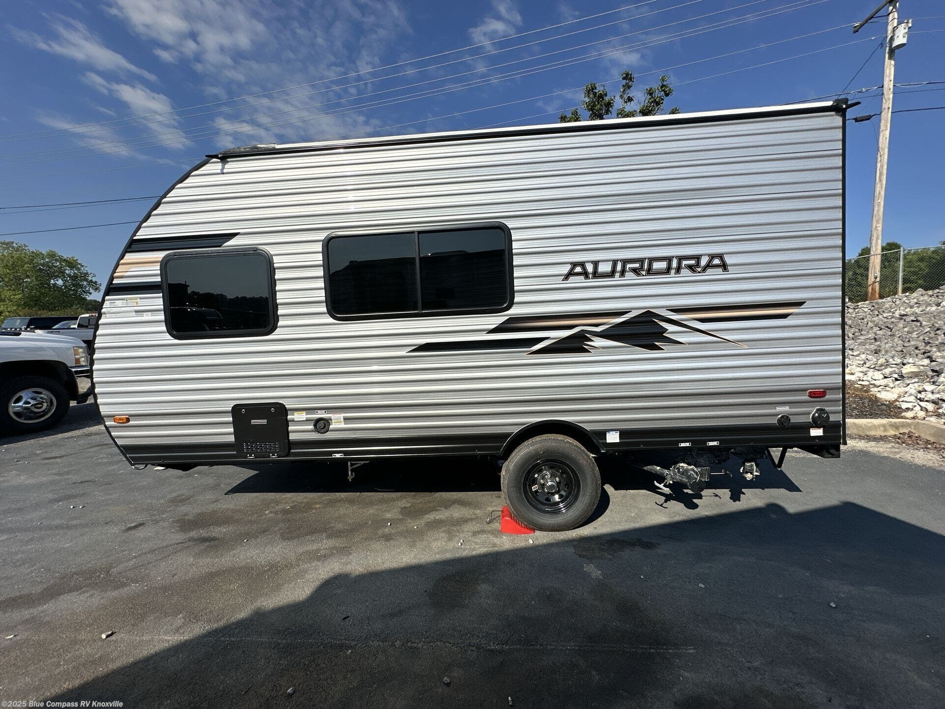 Contact us now about this 2026 Forest River Aurora Light 16BHX! 2026 Aurora Light 16BHX by Forest River from Blue Compass RV Knoxville in Louisville, Tennessee