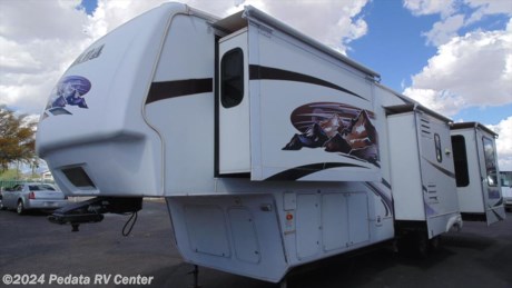This is a clean quad slide unit ready for the open road. Call 866-733-2829 for ma complete list of options. 