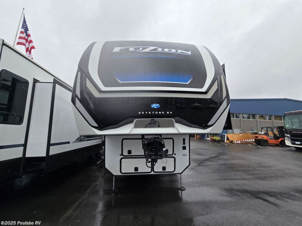 Call now about this 2025 Keystone Fuzion Toy Hauler 419! 2025 Keystone Fuzion Toy Hauler 419 - New Fifth Wheel For Sale by Poulsbo RV in Kent, Washington features Awning