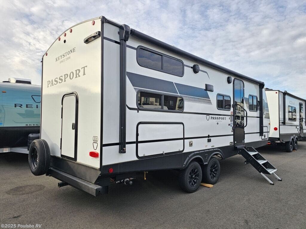 Contact us now about this 2026 Keystone Passport 229BHWE! 2026 Passport 229BHWE by Keystone from Poulsbo RV in Kent, Washington