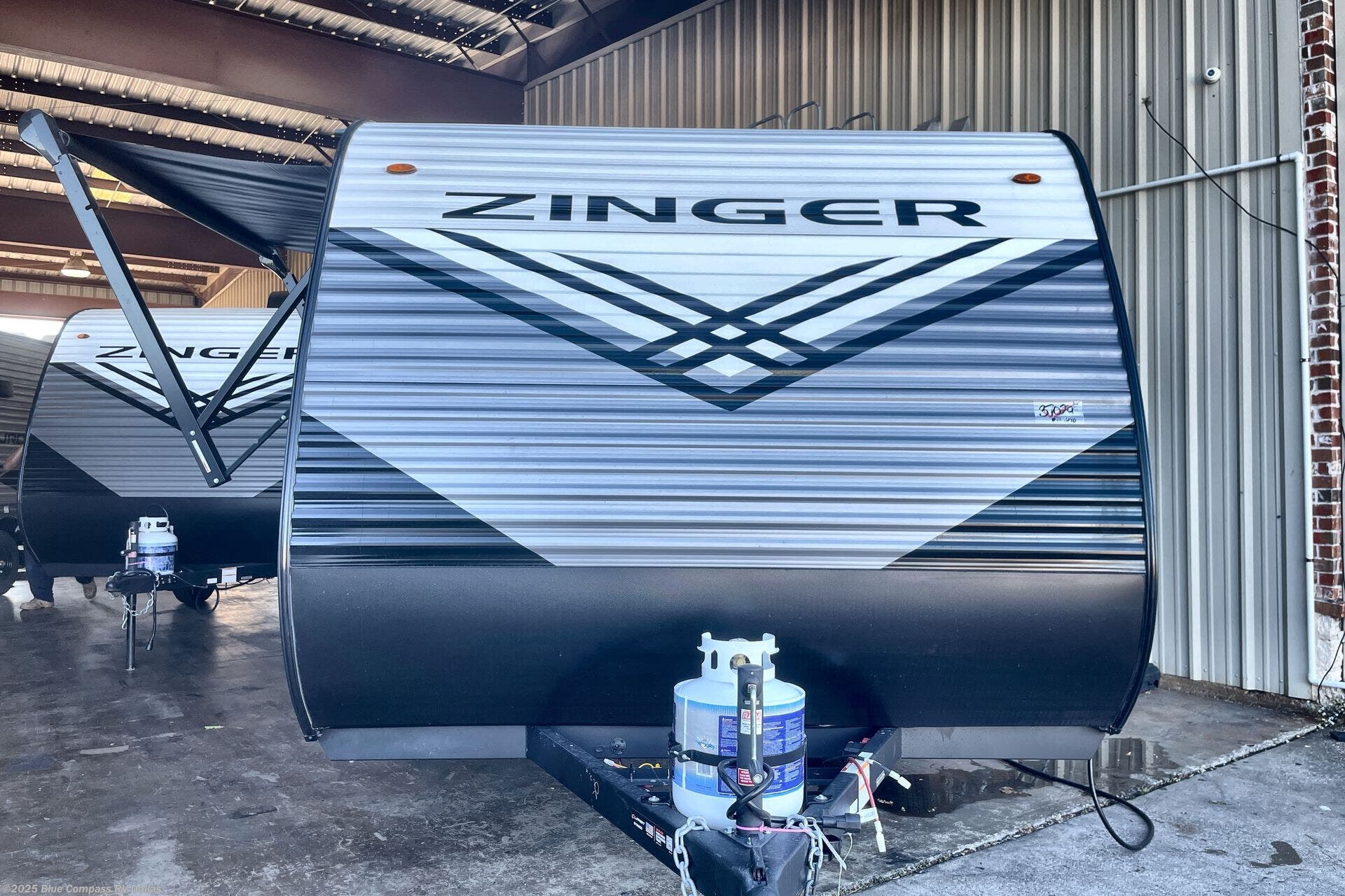 Contact us now about this 2026 CrossRoads Zinger Lite 12RD! 2026 Zinger Lite 12RD by CrossRoads from Blue Compass RV Dallas in Mesquite, Texas