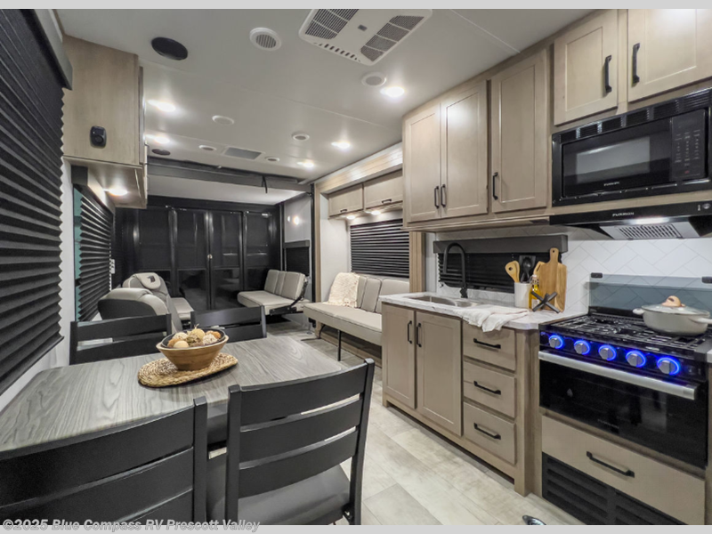 Call now about this 2025 Grand Design Momentum G-Class 30G! 2025 Grand Design Momentum G-Class 30G - New Toy Hauler For Sale by Blue Compass RV Prescott Valley in Prescott Valley, Arizona features Slideout