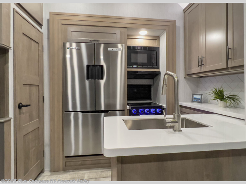 Call now about this 2025 Grand Design Momentum G-Class 320G! 2025 Grand Design Momentum G-Class 320G - New Toy Hauler For Sale by Blue Compass RV Prescott Valley in Prescott Valley, Arizona features Slideout