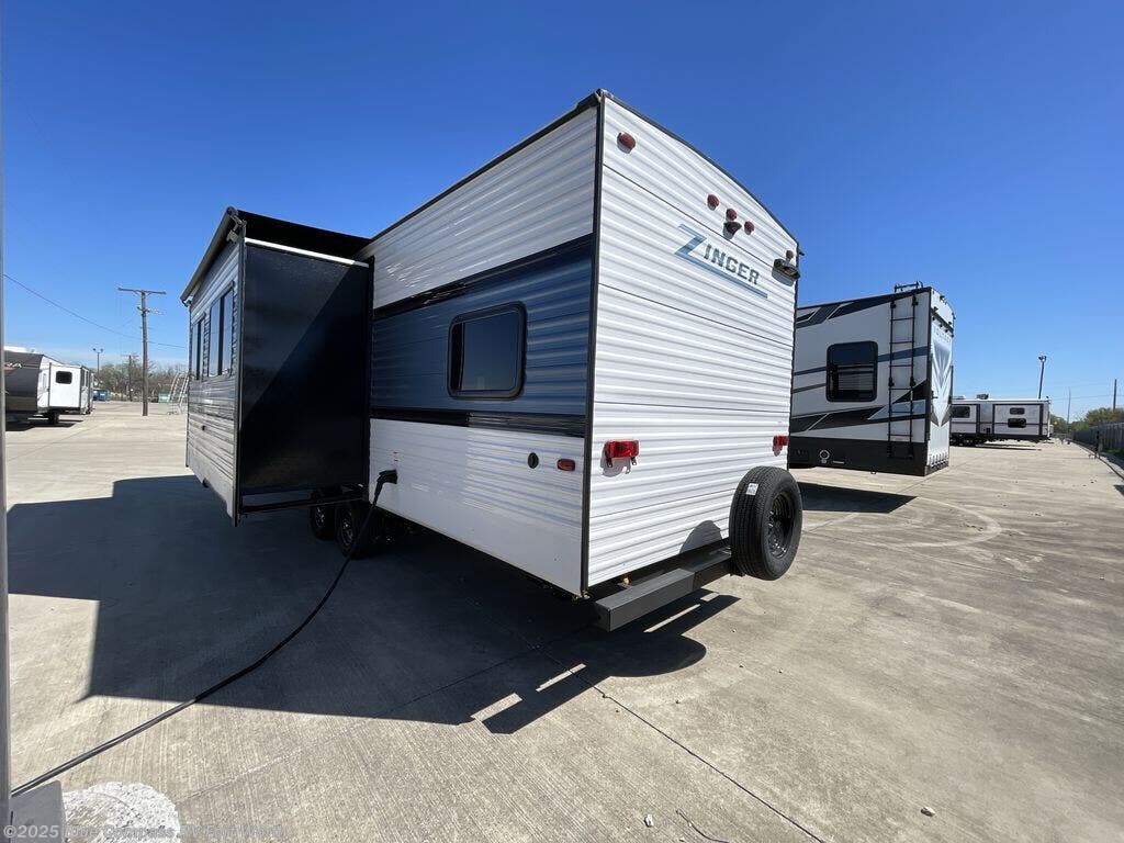 Call now about this 2025 CrossRoads Zinger 290QB! 2025 CrossRoads Zinger 290QB - Used Travel Trailer For Sale by Blue Compass RV Fort Worth in Fort Worth, Texas