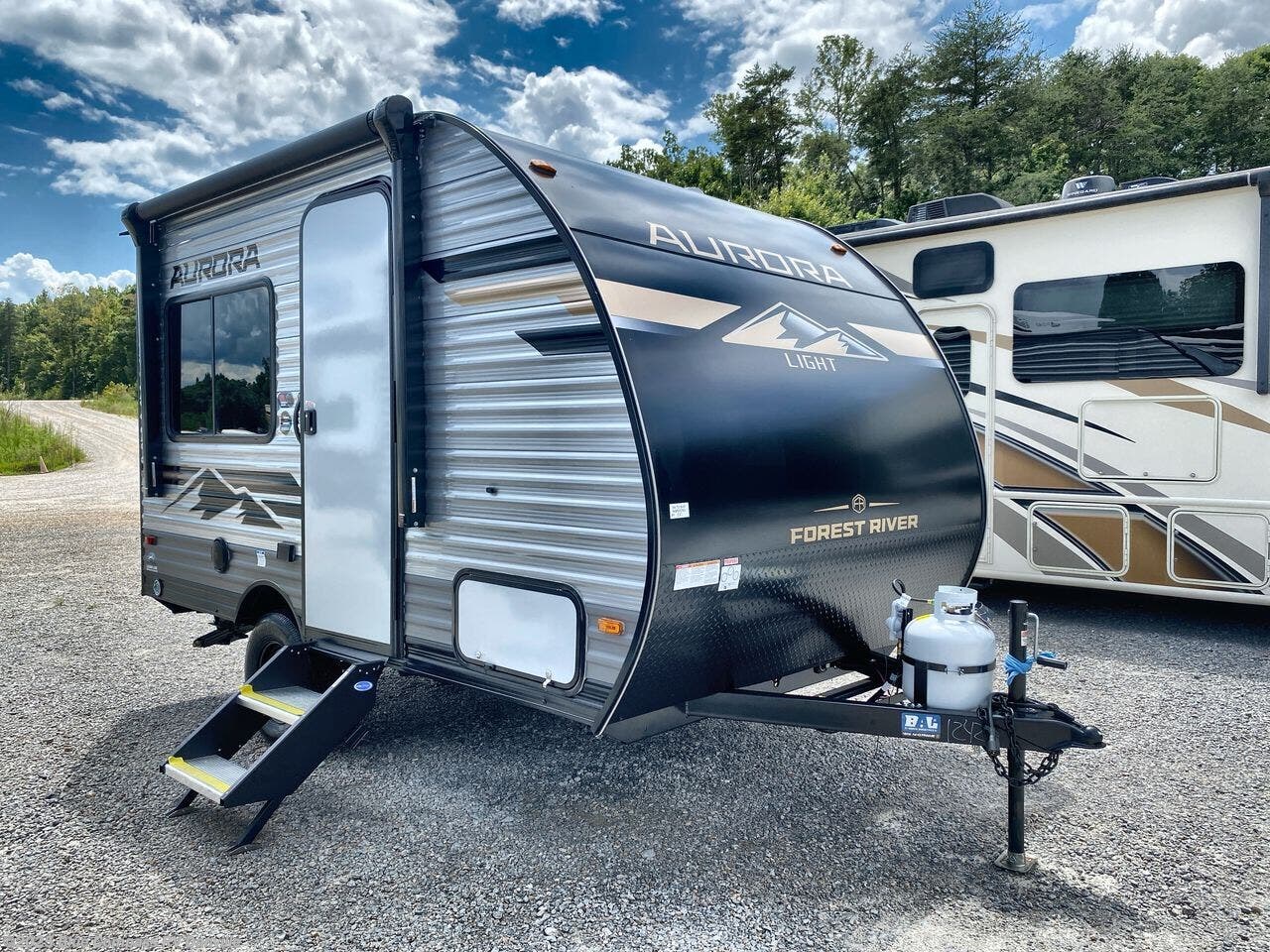 Contact us now about this 2026 Forest River Aurora Light 13RDX! 2026 Aurora Light 13RDX by Forest River from Blue Compass RV Danville in Ringgold, Virginia