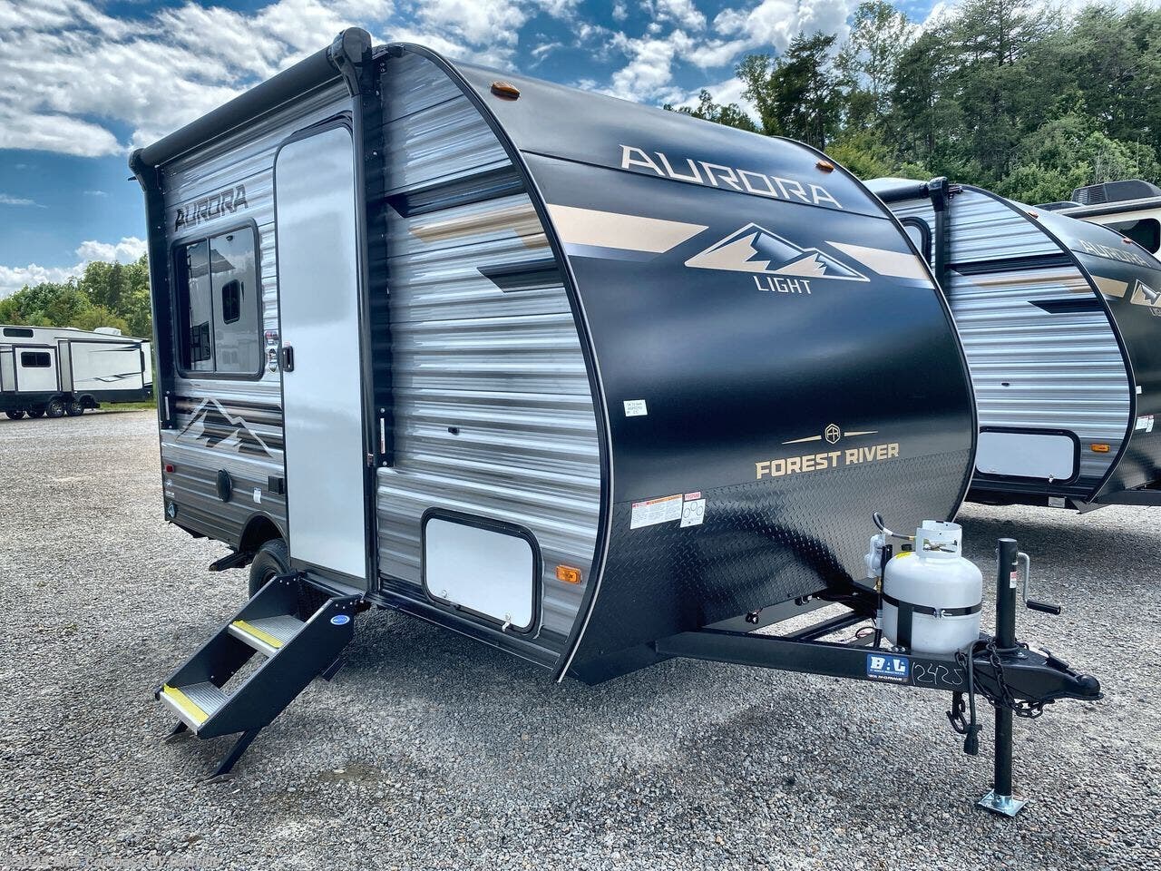 Contact us now about this 2026 Forest River Aurora Light 13RDX! 2026 Aurora Light 13RDX by Forest River from Blue Compass RV Danville in Ringgold, Virginia