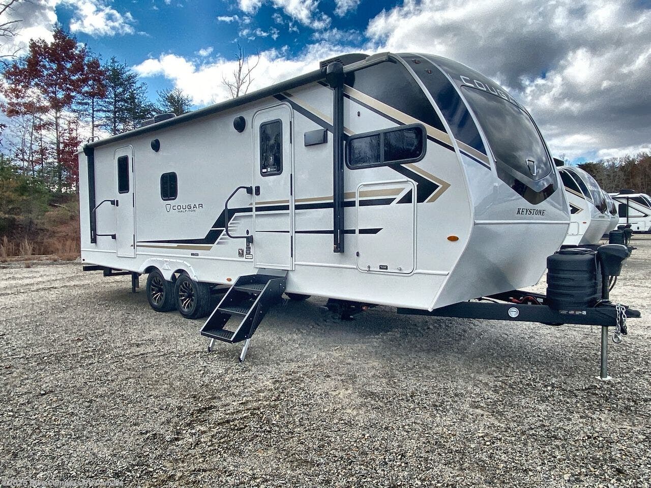Contact us now about this 2026 Keystone Cougar Half-Ton 25FKD! 2026 Cougar Half-Ton 25FKD by Keystone from Blue Compass RV Danville in Ringgold, Virginia