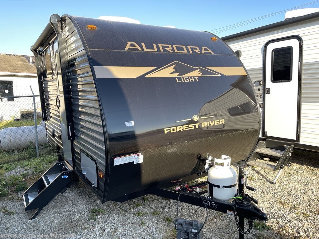 Contact us now about this 2026 Forest River Aurora Light 13BHX! 2026 Aurora Light 13BHX by Forest River from Blue Compass RV Danville in Ringgold, Virginia