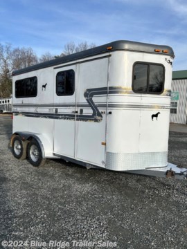 &lt;p&gt;2004 Hawk 2H BP w/5&#39; Dress, 7&#39;6&quot;x6&#39;, White, Wood Floor w/Mats in HA, Carpet in Dress, 84&quot; from chest bar to ramp, Aluminum over Steel, Rear Ramp w/Curtain Doors, Windows in Curtains, 2 Escape Doors, Removable Partitions, Solid Head Divider, Window in Dress Wall, Hay Bags, Bridle Hooks, 2 Saddle Racks, Spare Tire, Weight Distribution Hitch, GVWR 7000, Empty 3500, Carry 3500&lt;/p&gt;