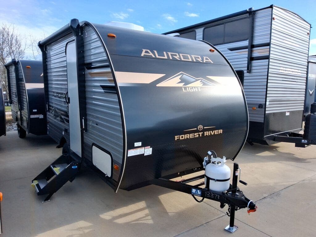Contact us now about this 2026 Forest River Aurora Light 13RKX! 2026 Aurora Light 13RKX by Forest River from Blue Compass RV Springfield in Strafford, Missouri