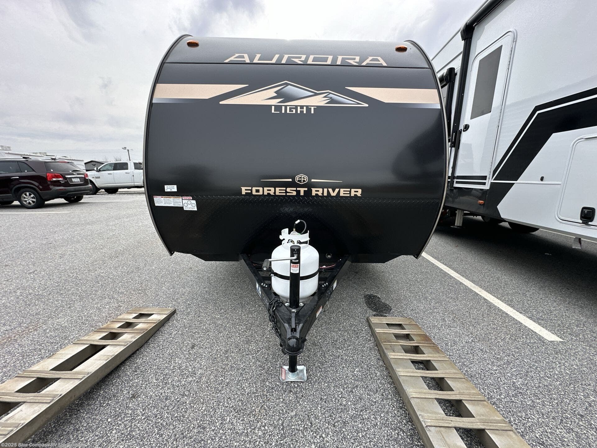 Contact us now about this 2026 Forest River Aurora Light 13BHX! 2026 Aurora Light 13BHX by Forest River from Blue Compass RV Spartanburg in Duncan, South Carolina